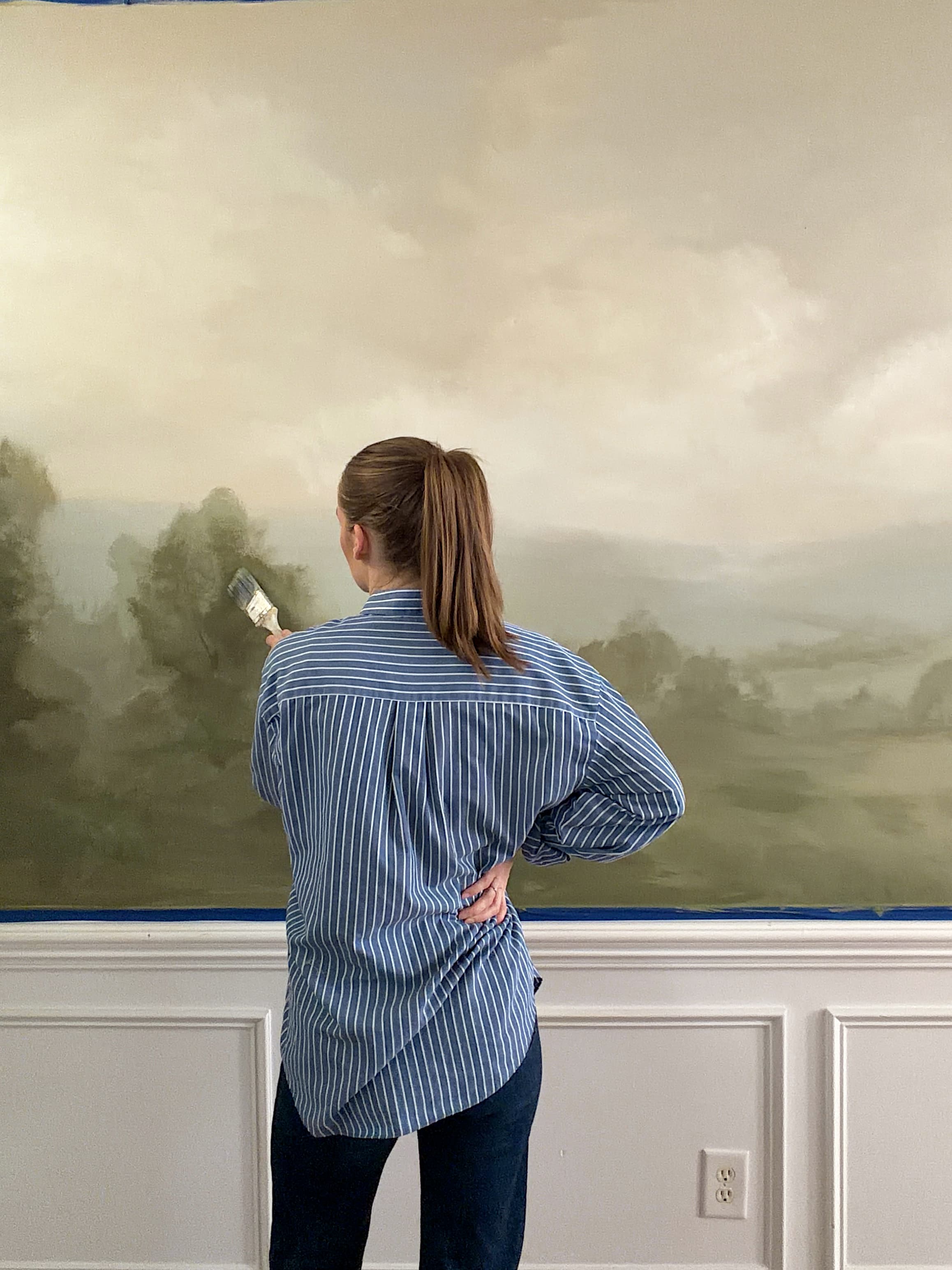 Hand-painted landscape mural by Anna Lyn Cook